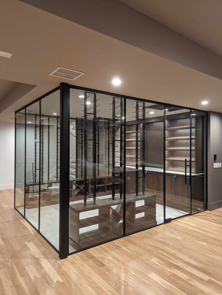 Modern Glass Wine Room With Wooden Shelves by Red Leaf Solutions in Castle Rock, CO.
